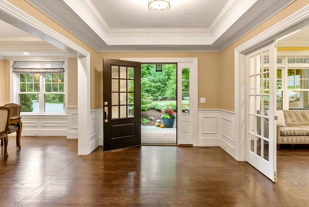 4 Fields Lane Wayland, MA 01778 - Photo 5 of 39 a view of a living room and a large window