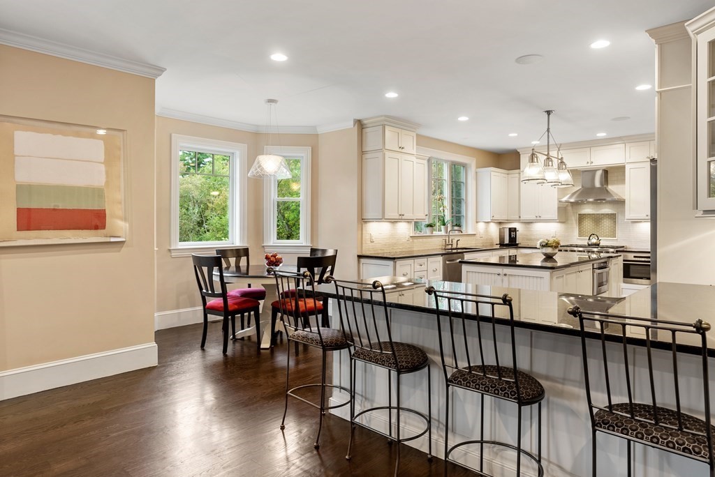 4 Fields Lane Wayland, MA 01778 - Photo 8 of 39 a room with stainless steel appliances kitchen island granite countertop furniture and a large window