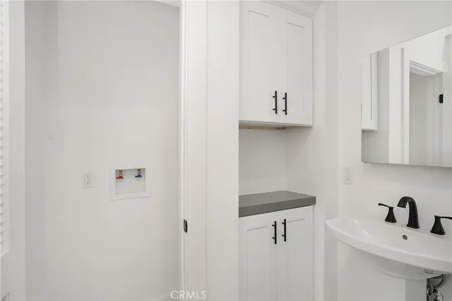 a bathroom with a sink and a vanity