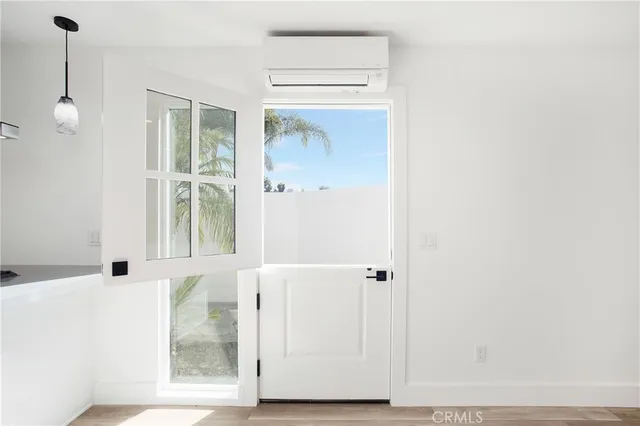 a view of a bathroom with a glass door