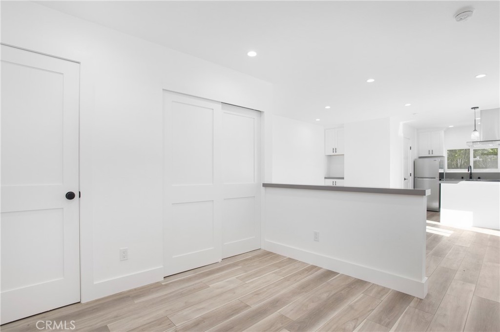 24216 Las Naranjas Drive, Unit B Laguna Niguel, CA 92677 - Photo 8 of 15 a view of kitchen with wooden floor