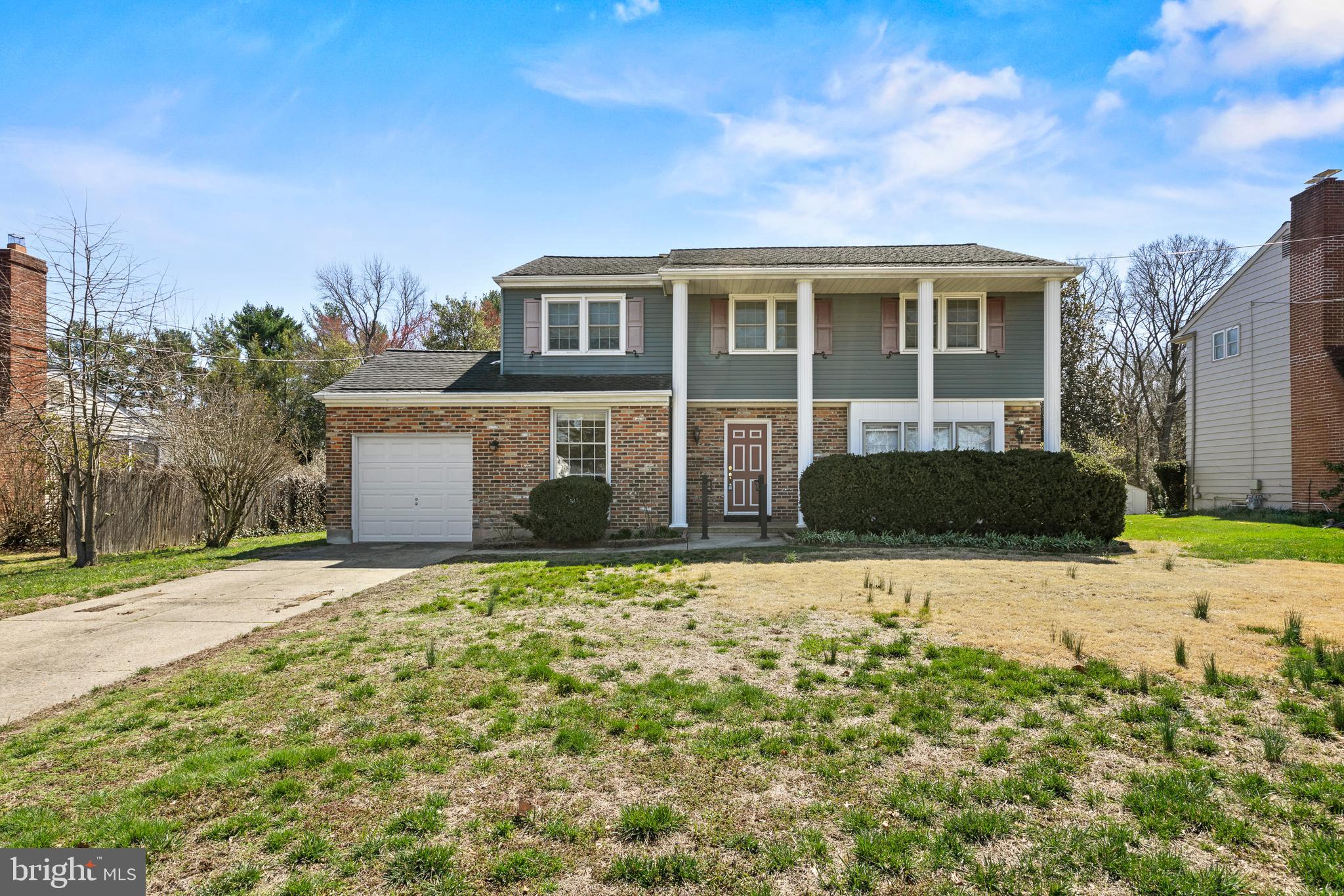 413 Columbia Avenue Pitman, NJ 08071 - Photo 1 of 33 a front view of a house with a yard