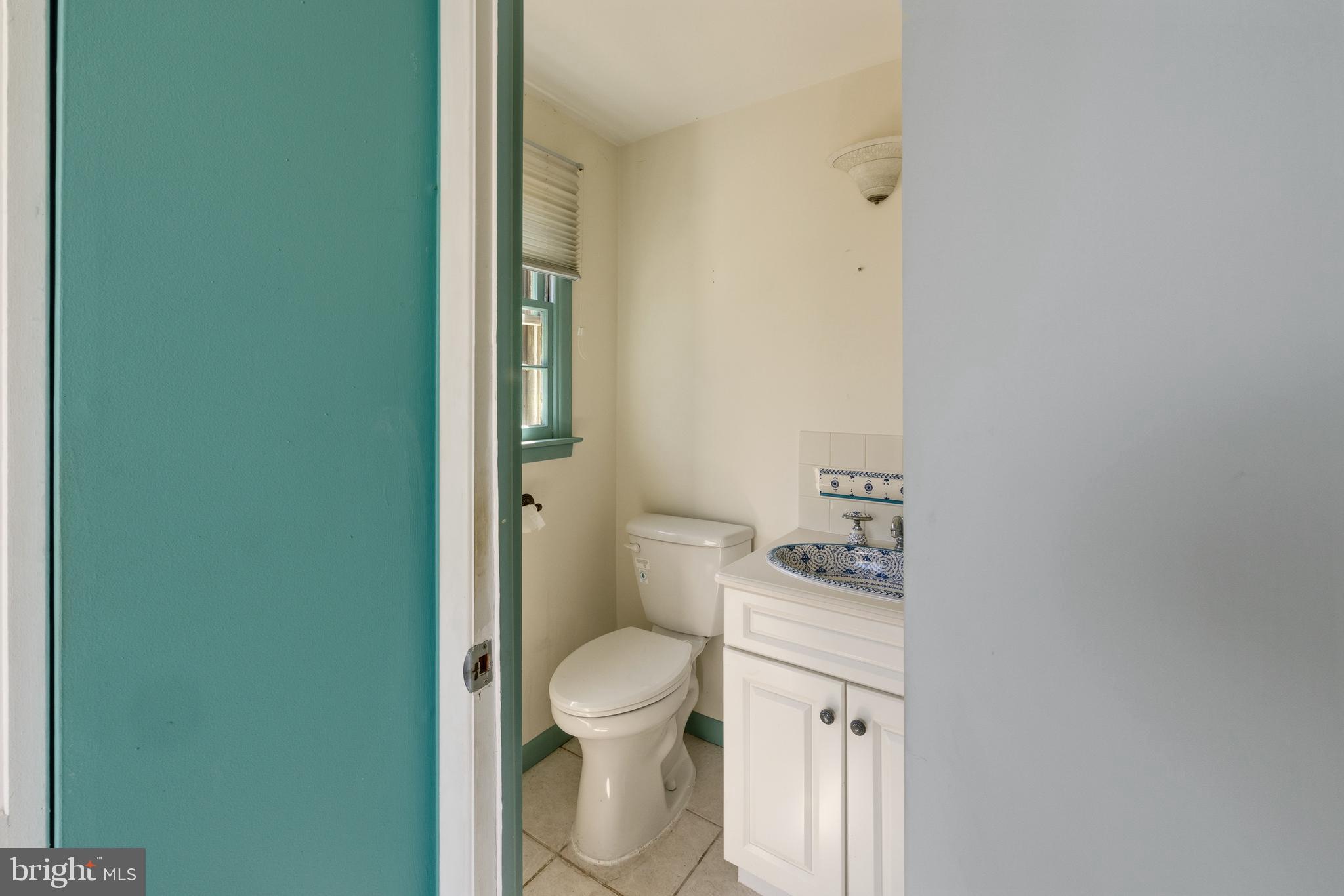 413 Columbia Avenue Pitman, NJ 08071 - Photo 19 of 33 a bathroom with a toilet and a shower