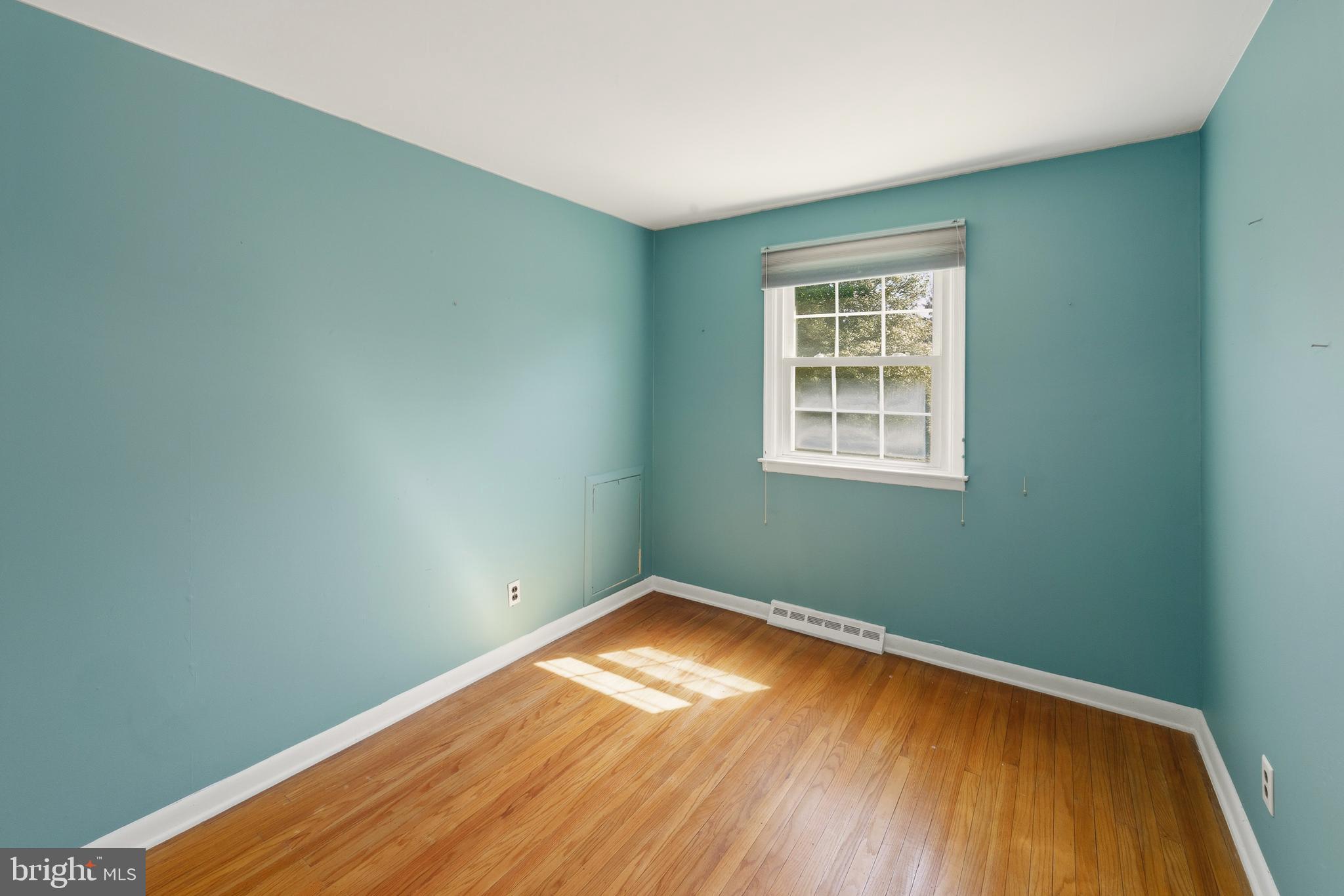 413 Columbia Avenue Pitman, NJ 08071 - Photo 26 of 33 an empty room with a window