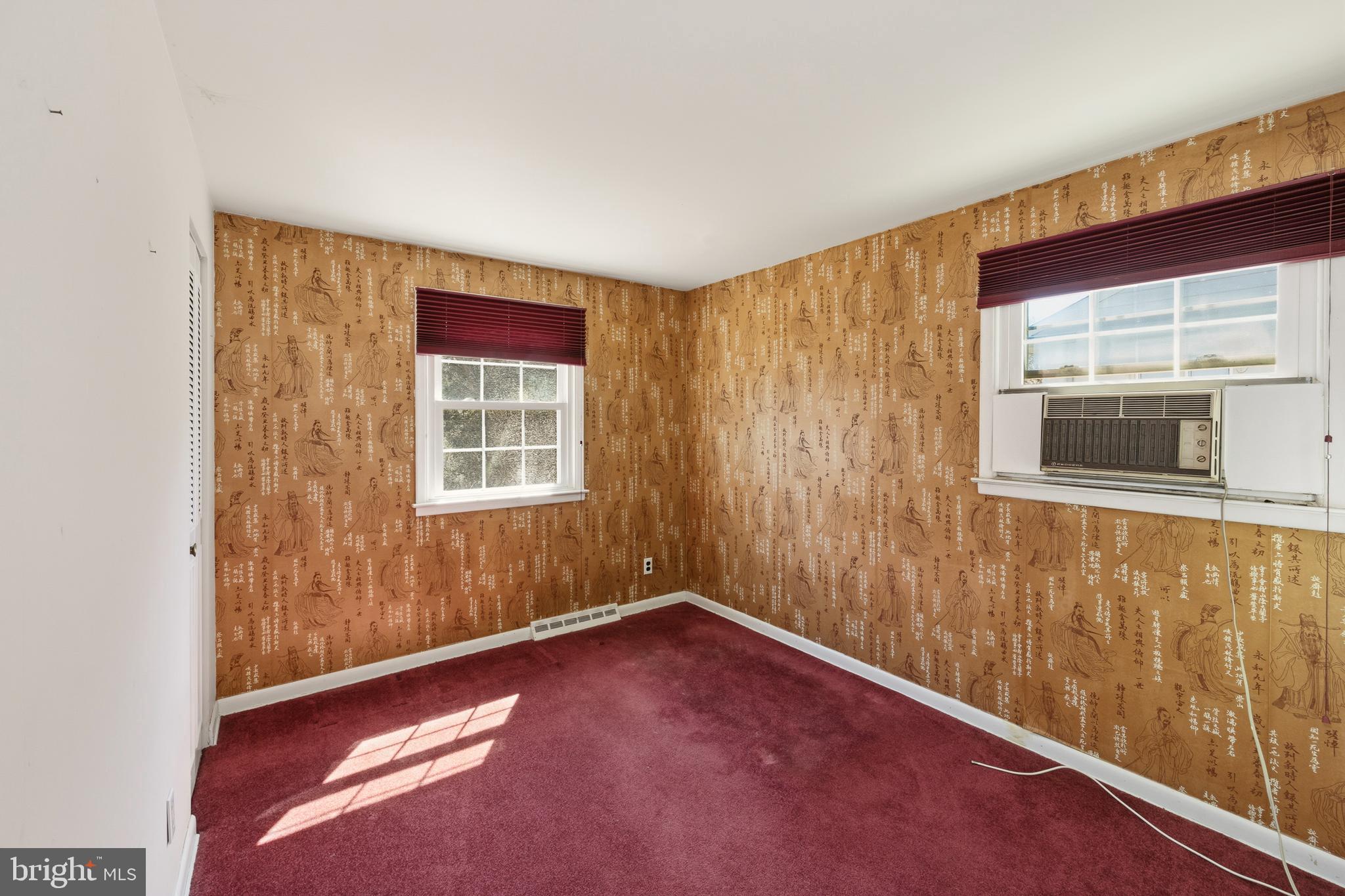 413 Columbia Avenue Pitman, NJ 08071 - Photo 27 of 33 a view of an empty room with a window