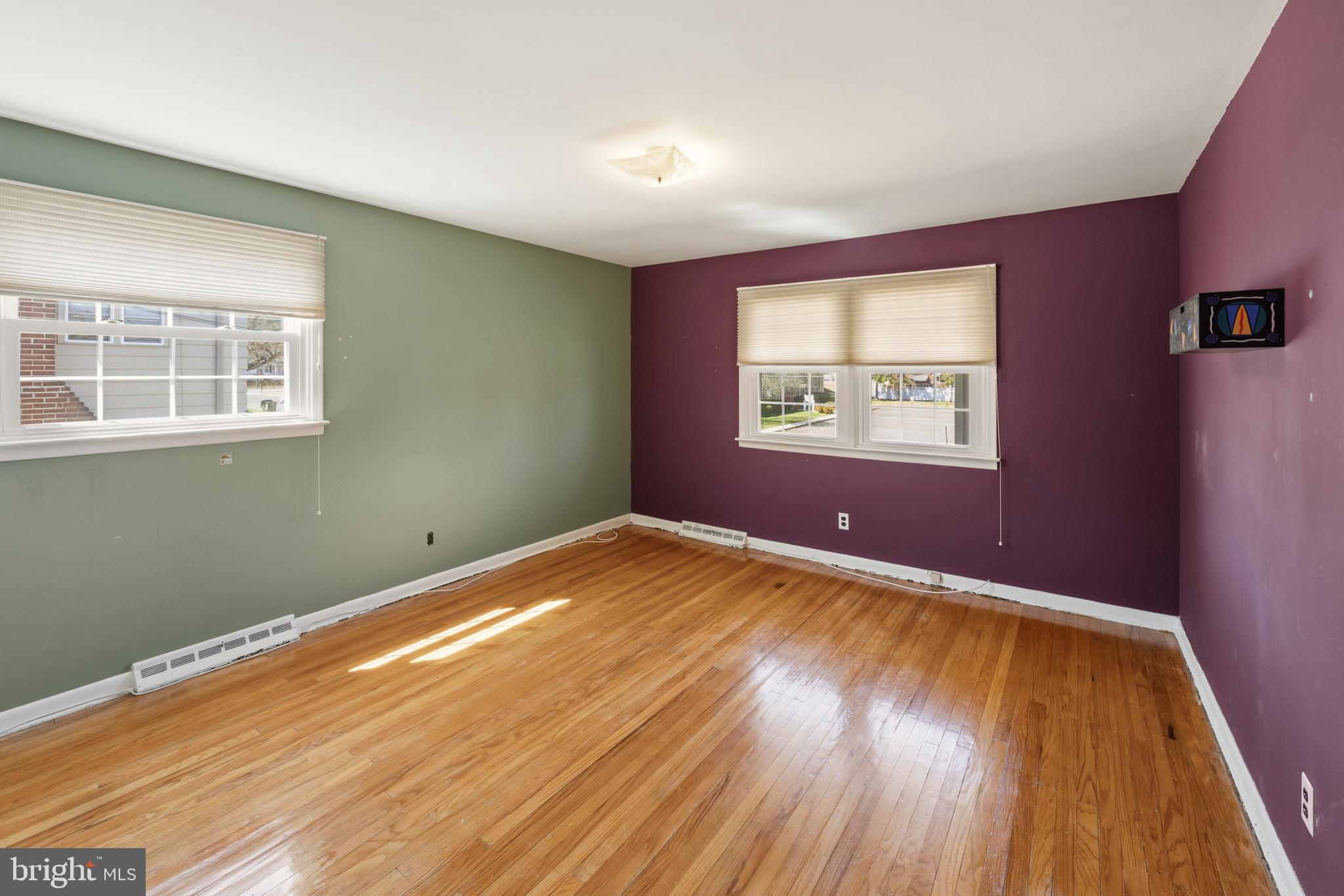 413 Columbia Avenue Pitman, NJ 08071 - Photo 28 of 33 a view of empty room with wooden floor and fan
