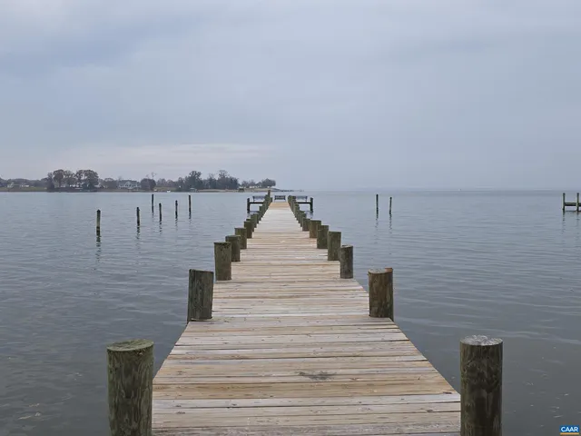 a view of wooden floor with a lake view