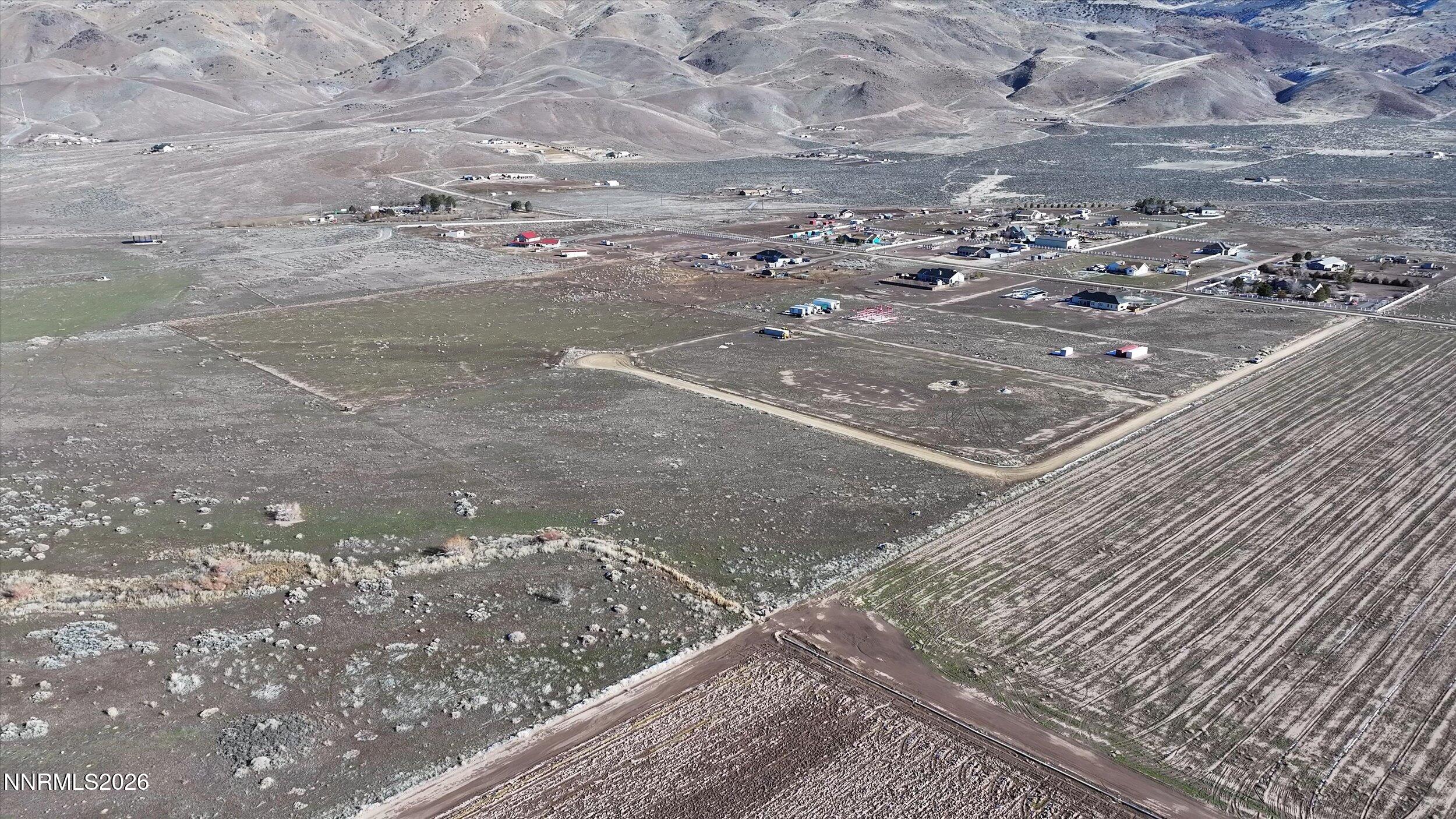65 Tumbleweed Court Reno, NV 89510 - Photo 4 of 12 a view of a road with parking space