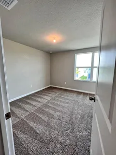 en empty room with windows