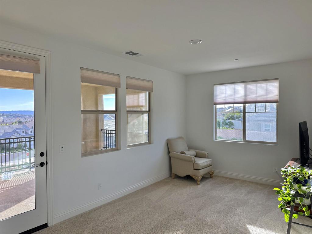 39529 Dayspring Way Temecula, CA 92591 - Photo 20 of 49 a living room with furniture and a window
