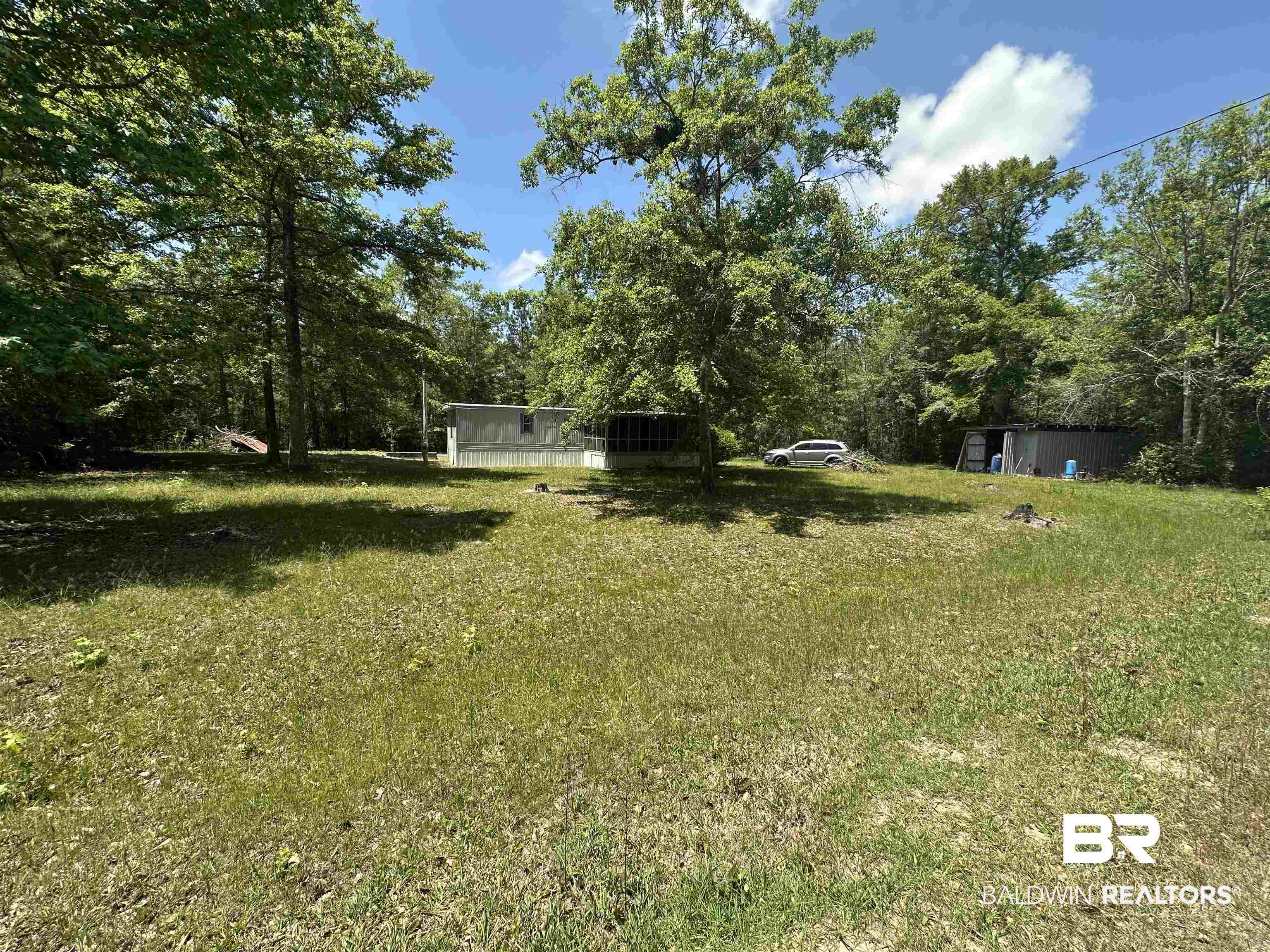 15660 Kennedy Road Bon Secour, AL 36511 - Photo 2 of 9 View of yard