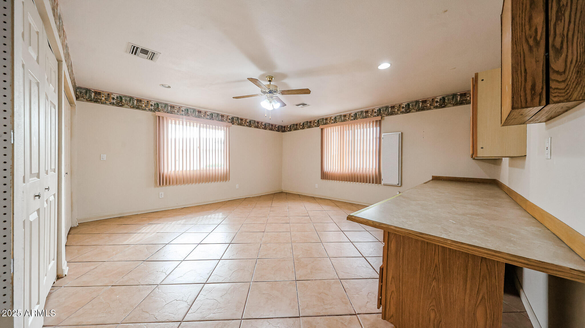 11851 North Thunderbird Road Sun City, AZ 85351 - Photo 17 of 46 a view of an empty room with a window