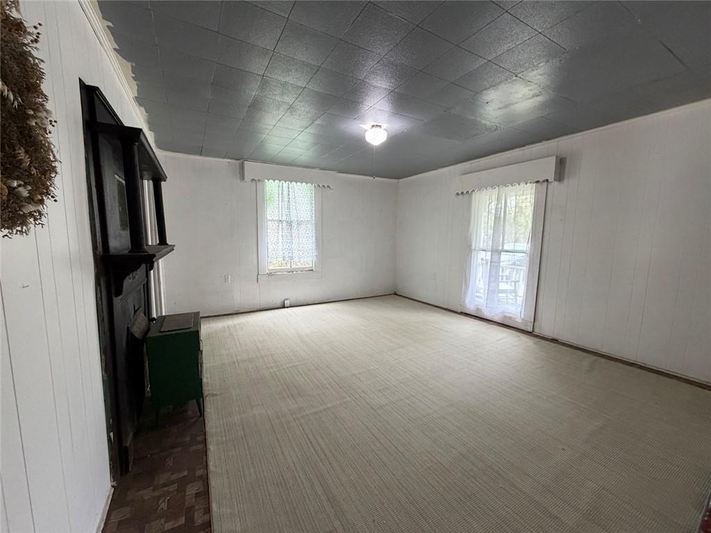 209 Old Perry Road Marshallville, GA 31057 - Photo 6 of 40 a view of empty room with windows