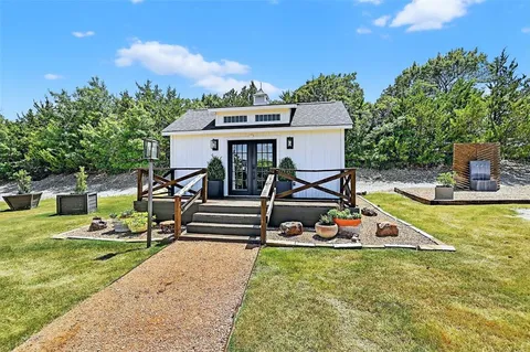 a view of a back yard of the house