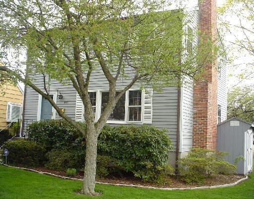 893 South Pine Creek Road Fairfield, CT 06824 - Photo 1 of 1 front view of a house with a yard