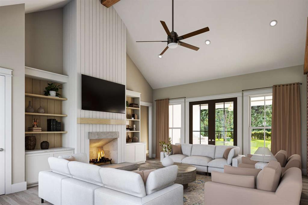 3 Quarter Loop Poolville, TX 76487 - Photo 2 of 40 a living room with furniture a fireplace and a flat screen tv