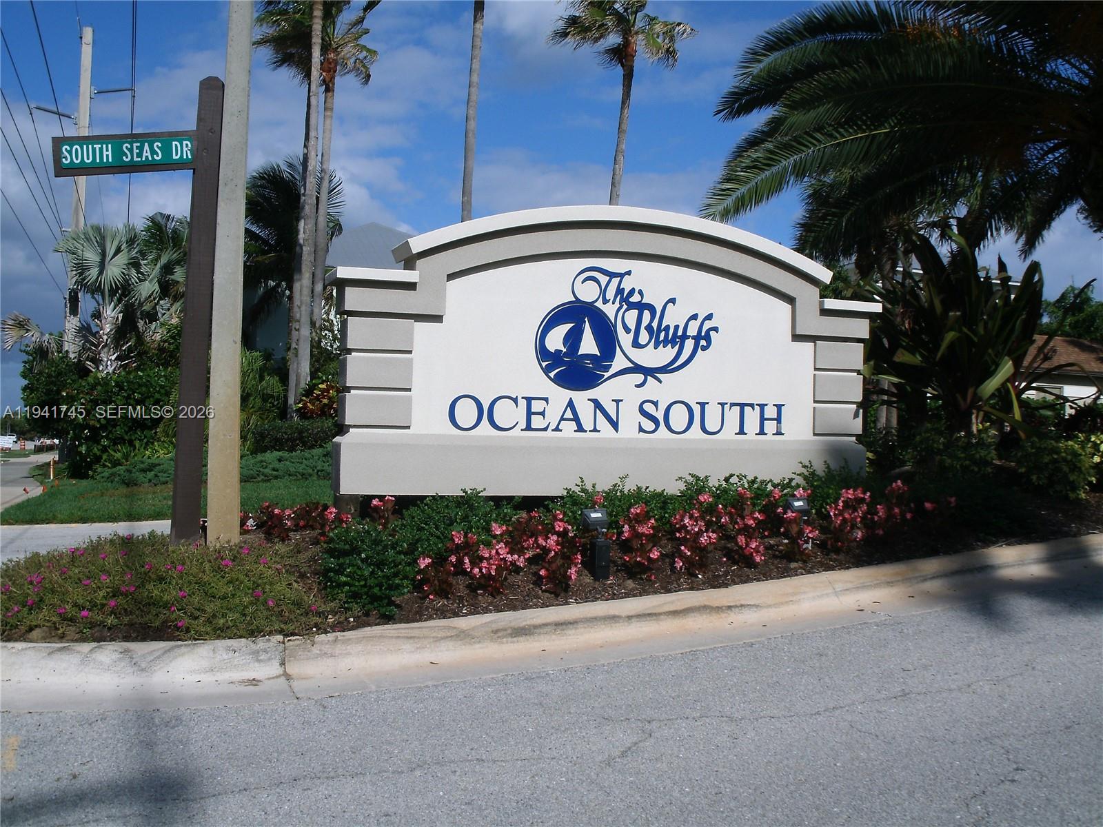 701 South Seas Drive, Unit 206 Jupiter, FL 33477 - Photo 19 of 19 a sign on the side of a building