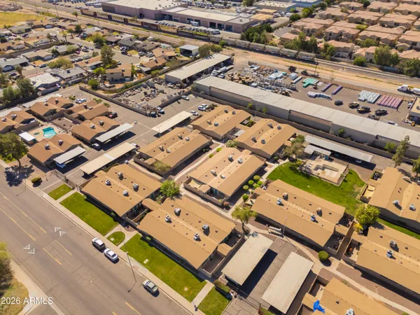 an aerial view of residential house with outdoor space