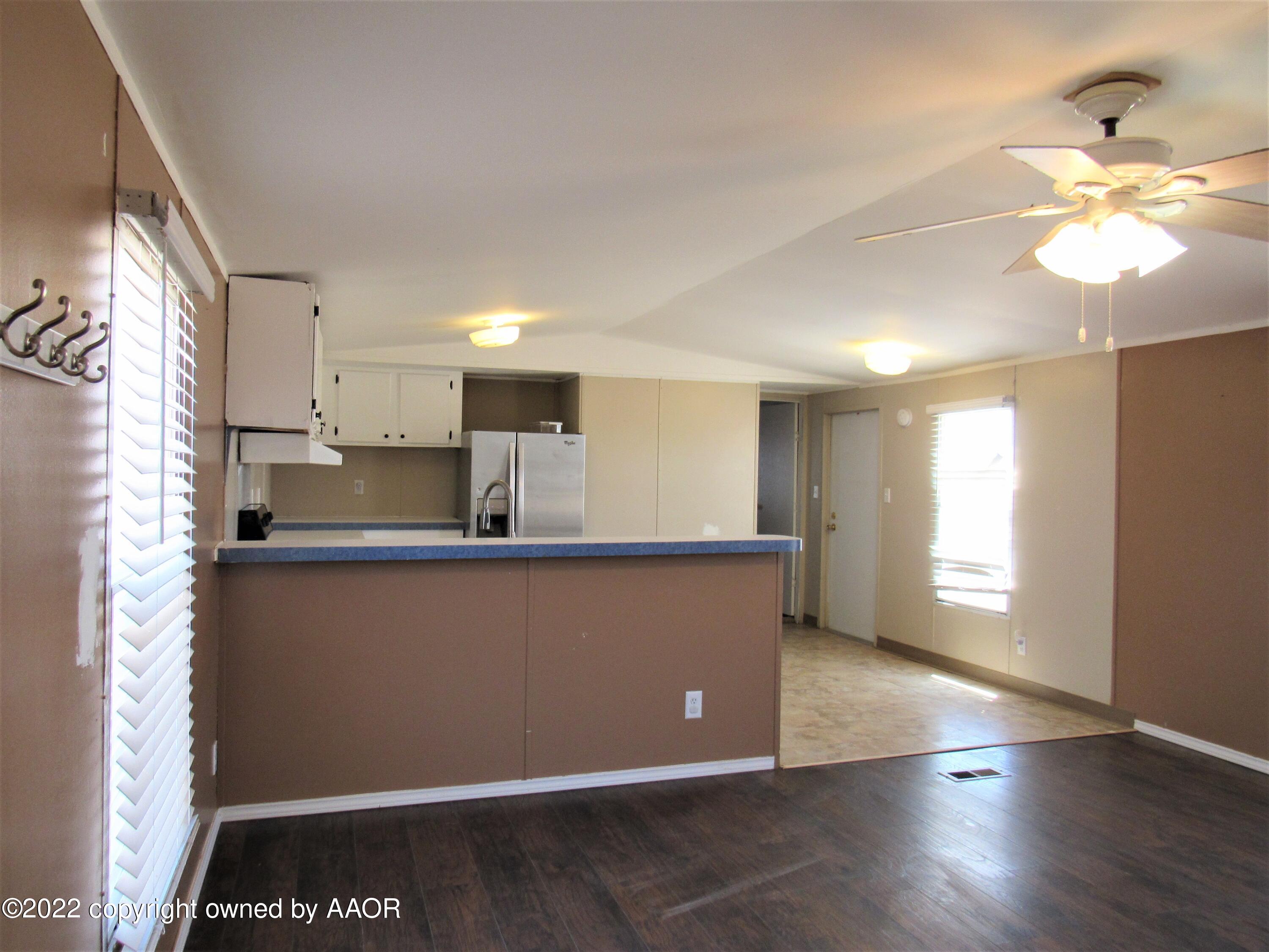 6709 Susie Road Amarillo, TX 79118 - Photo 2 of 17 Living Room/Kitchen