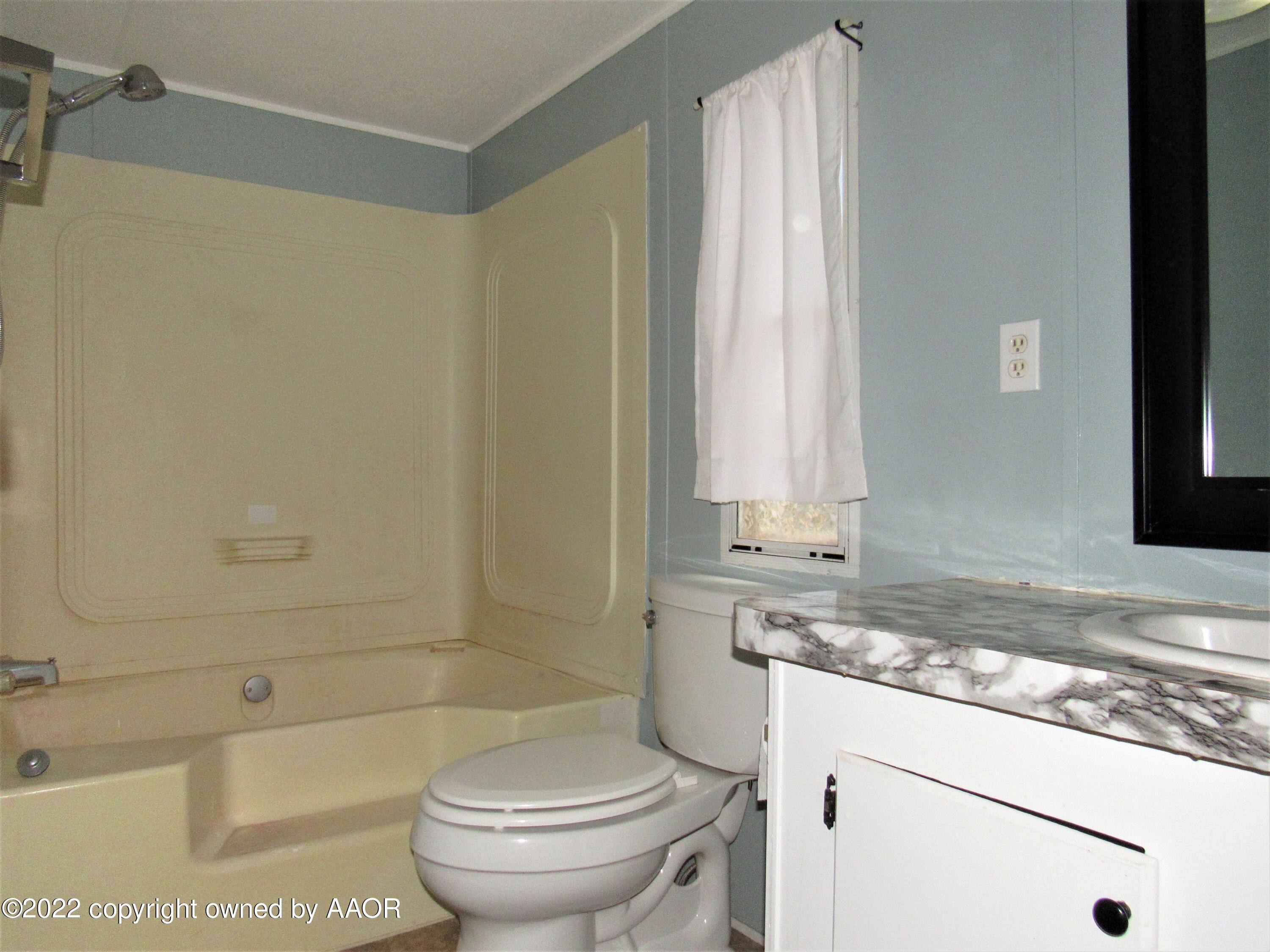 6709 Susie Road Amarillo, TX 79118 - Photo 7 of 17 Master Bathroom