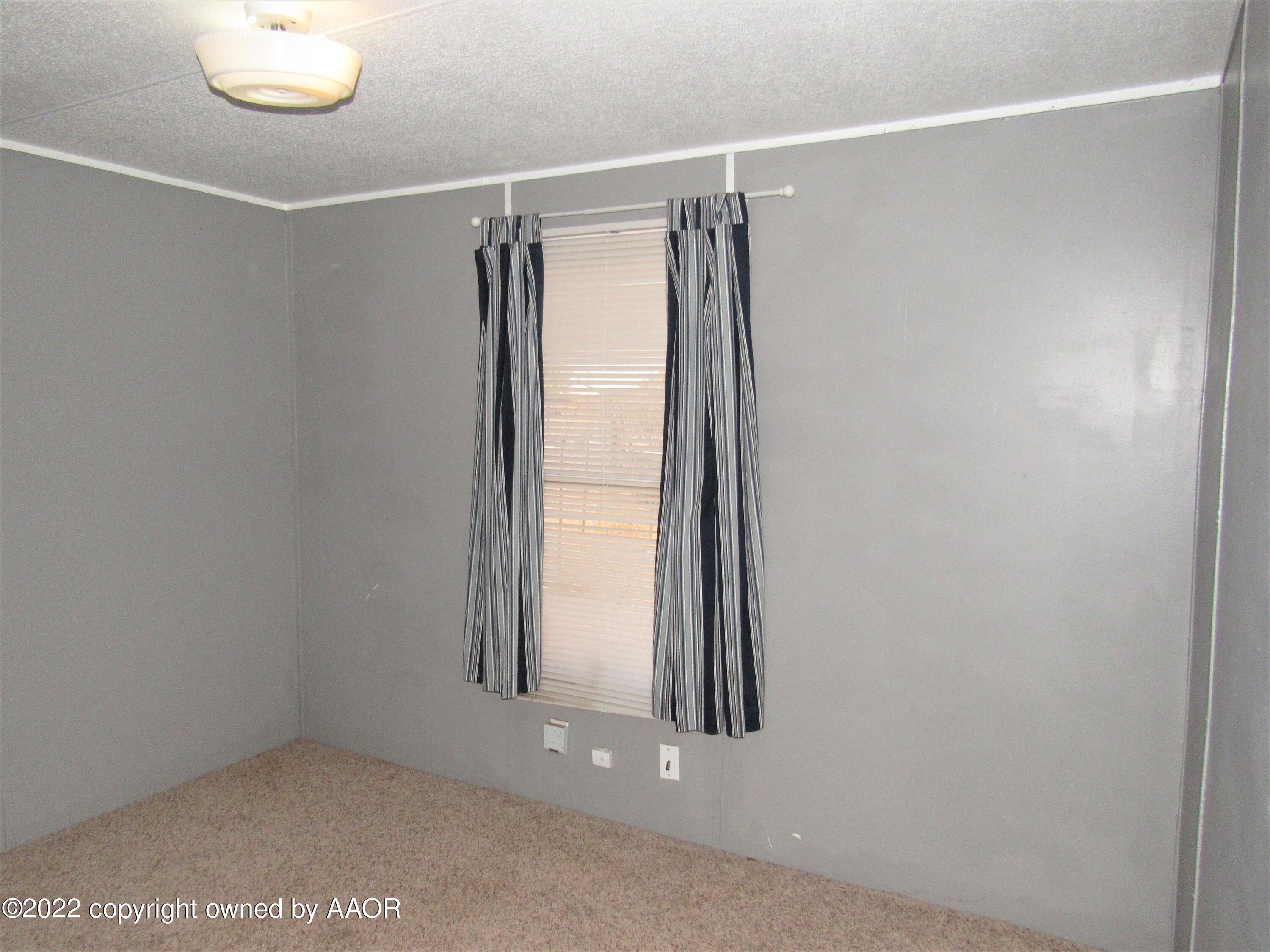6709 Susie Road Amarillo, TX 79118 - Photo 10 of 17 End Bedroom