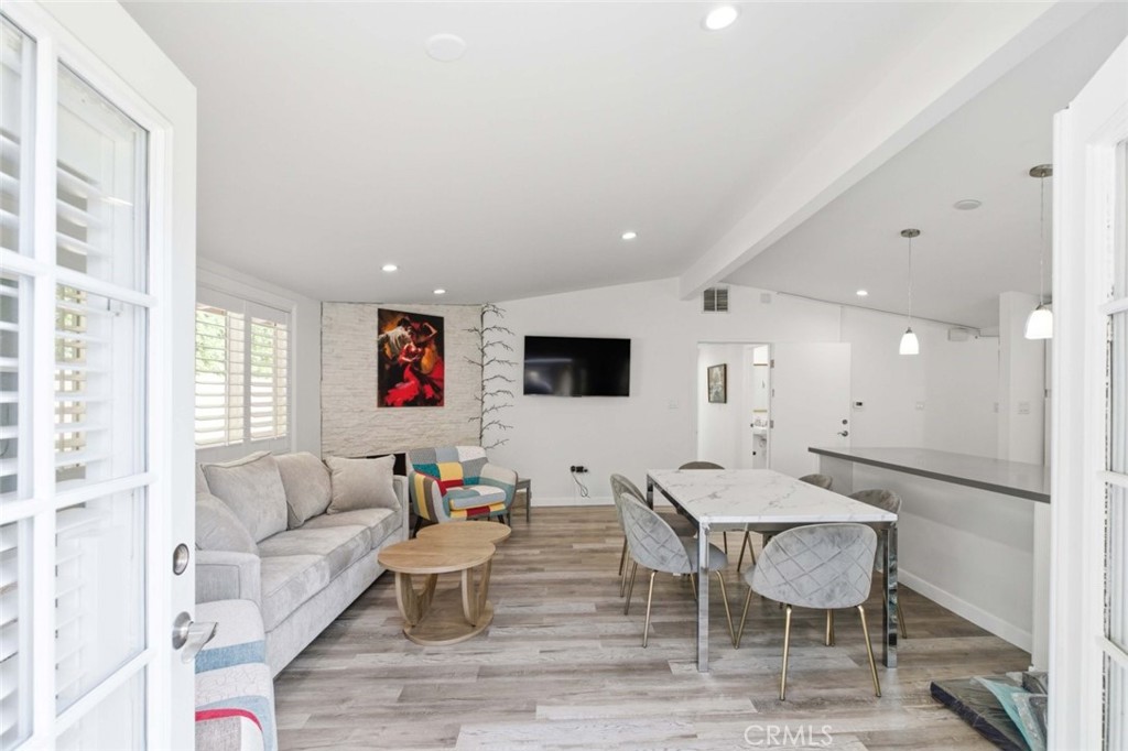 301 West Ashby Street Azusa, CA 91702 - Photo 39 of 75 a living room with furniture and a flat screen tv