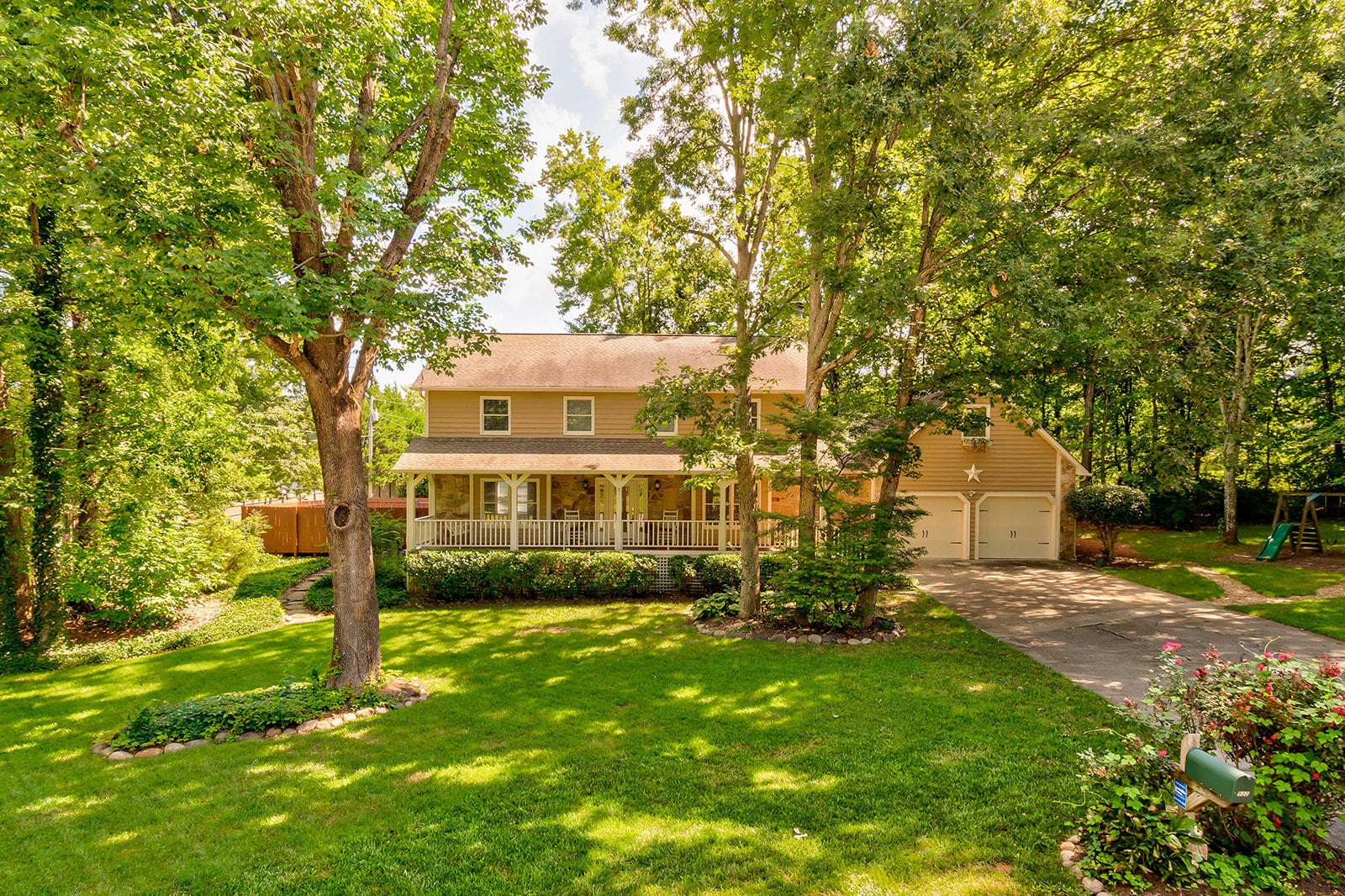 502 Rolling Creek Road Knoxville, TN 37934 - Photo 1 of 27 a front view of a house with a yard