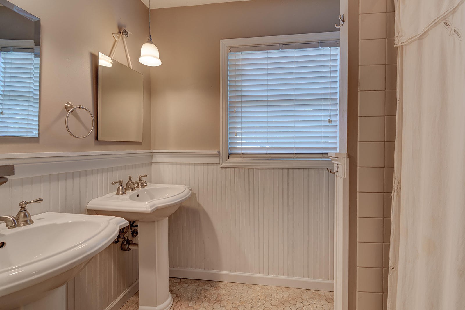 502 Rolling Creek Road Knoxville, TN 37934 - Photo 17 of 27 a bathroom with a sink and a mirror