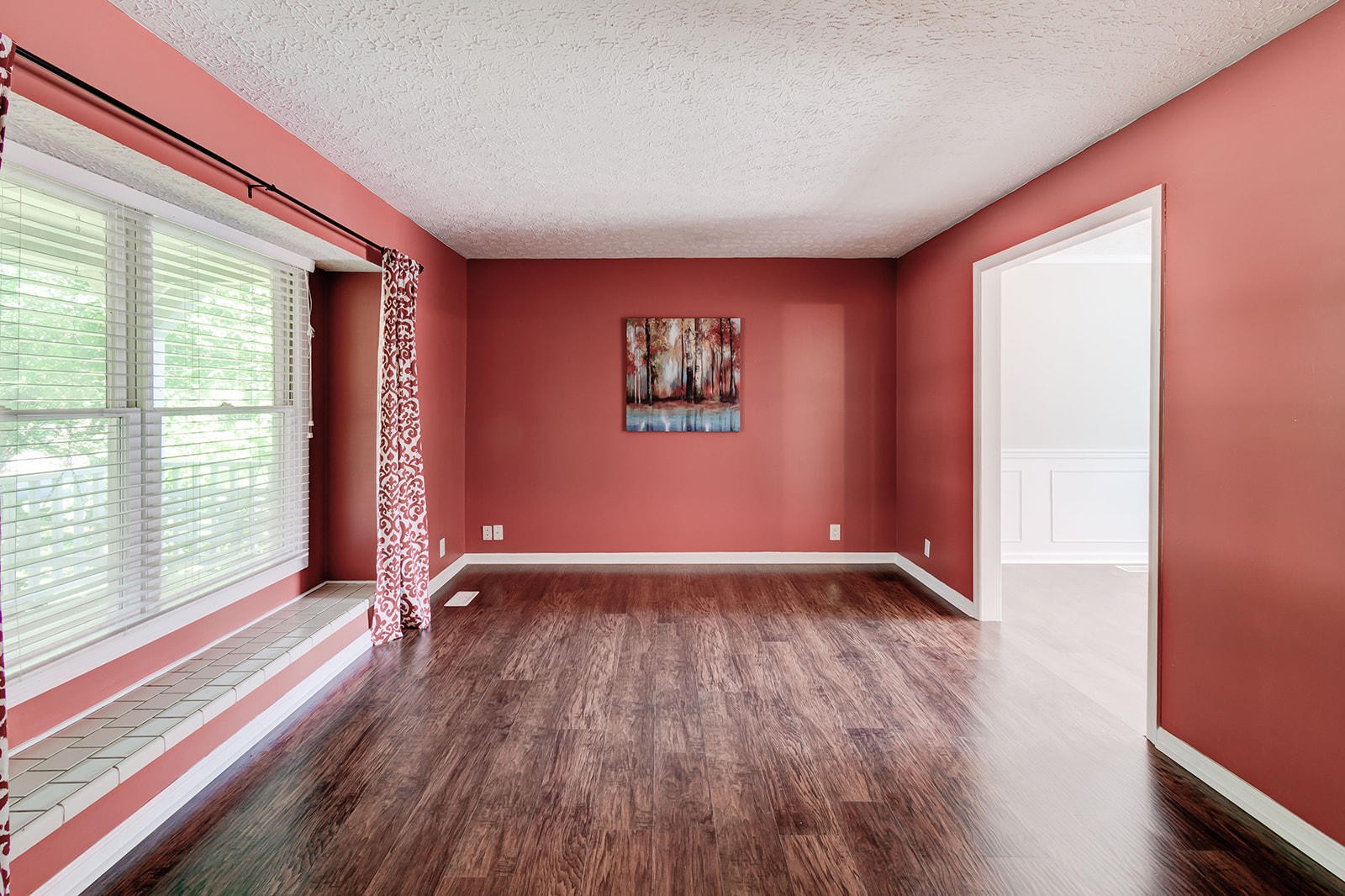 502 Rolling Creek Road Knoxville, TN 37934 - Photo 4 of 27 an empty room with wooden floor and windows
