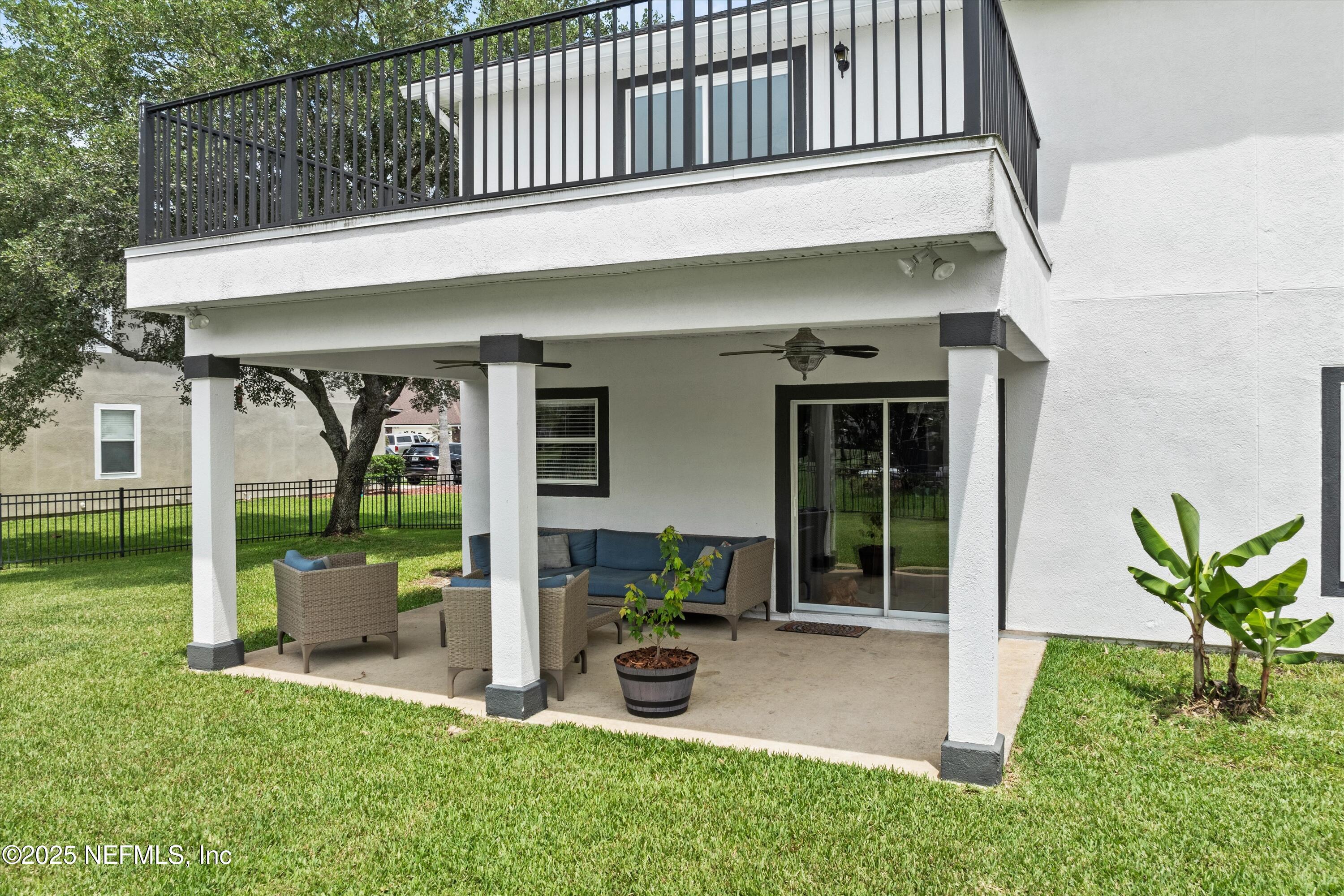 2360 Golfview Drive Fleming Island, FL 32003 - Photo 20 of 60 a view of a house with backyard porch and sitting area