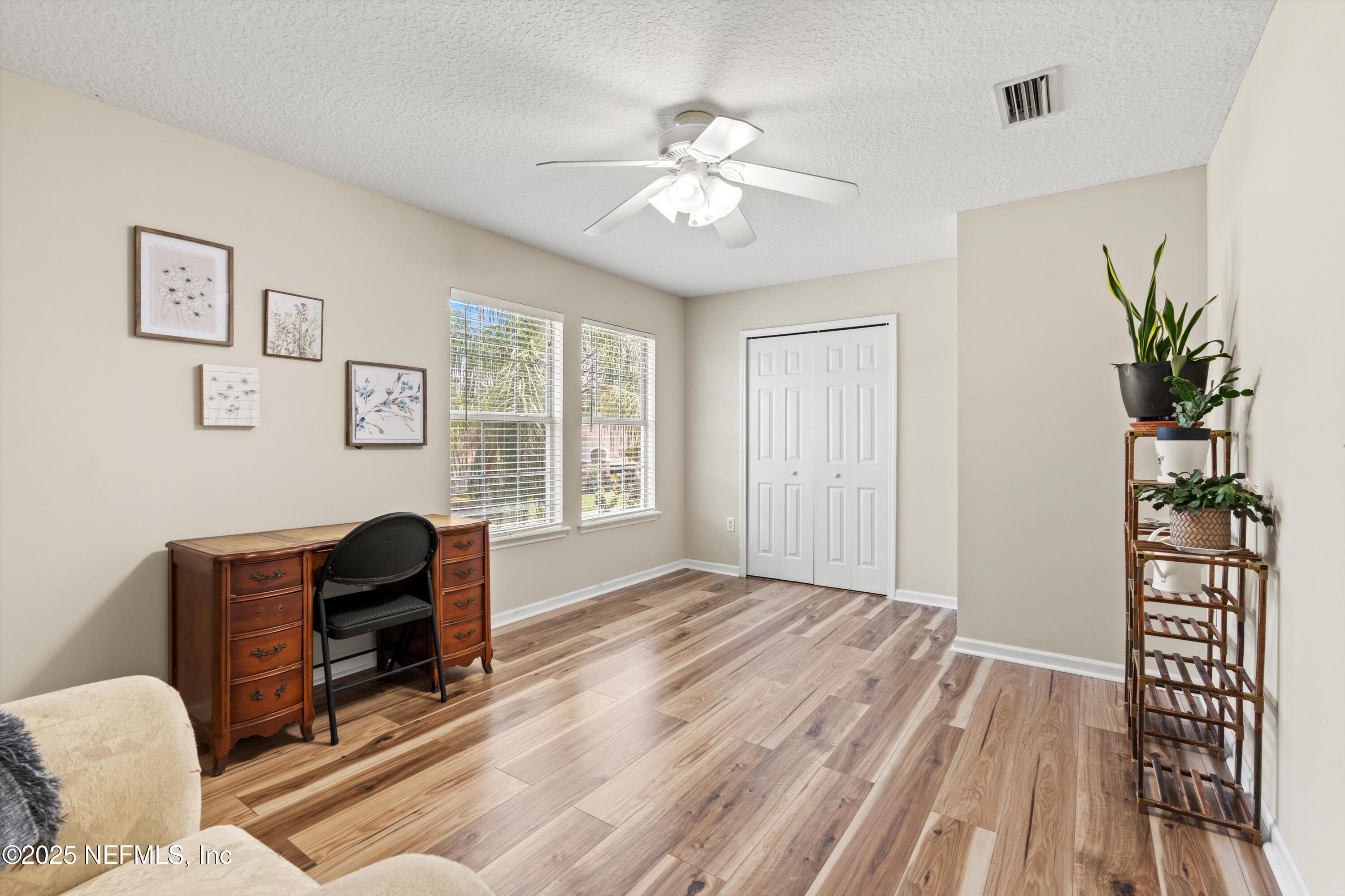 2360 Golfview Drive Fleming Island, FL 32003 - Photo 28 of 60 a view of a livingroom with workspace and a window