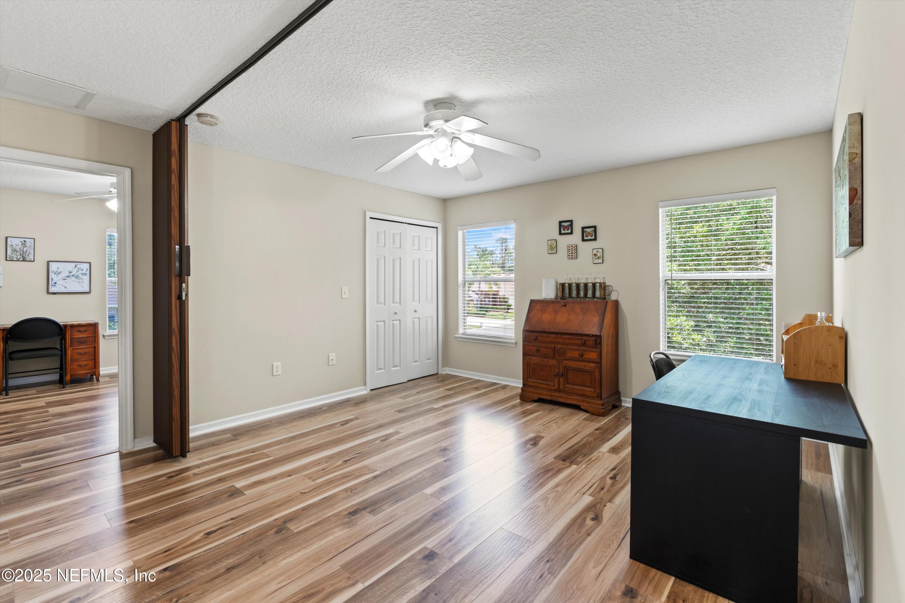 2360 Golfview Drive Fleming Island, FL 32003 - Photo 29 of 60 a living room with furniture and a window