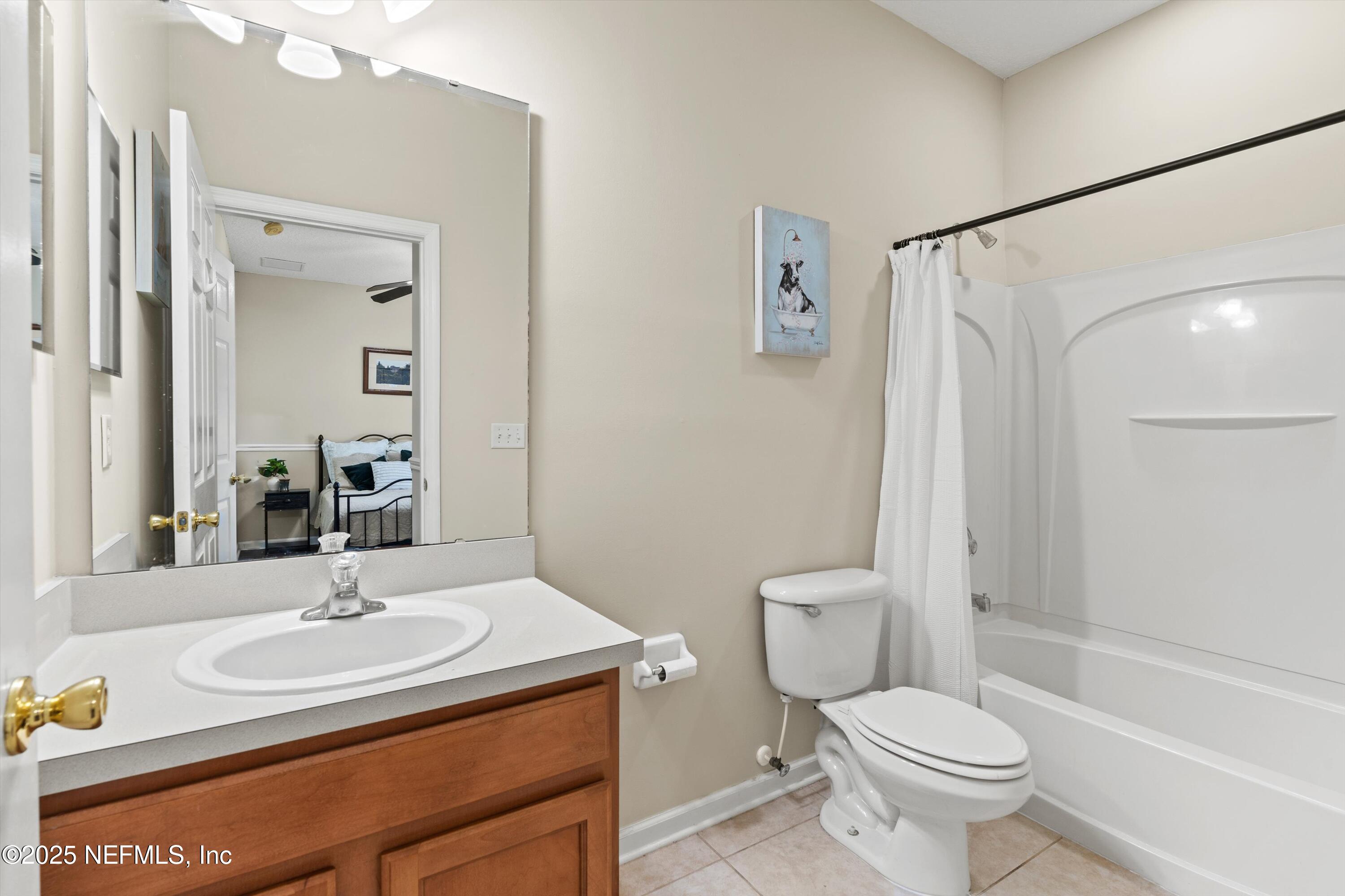 2360 Golfview Drive Fleming Island, FL 32003 - Photo 33 of 60 a bathroom with a sink toilet and shower