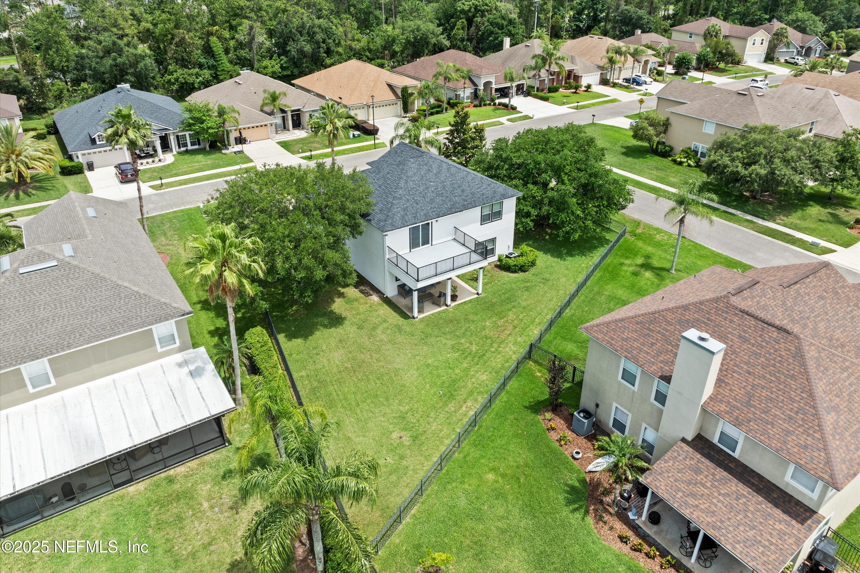 2360 Golfview Drive Fleming Island, FL 32003 - Photo 40 of 60 an aerial view of residential houses with outdoor space and a street