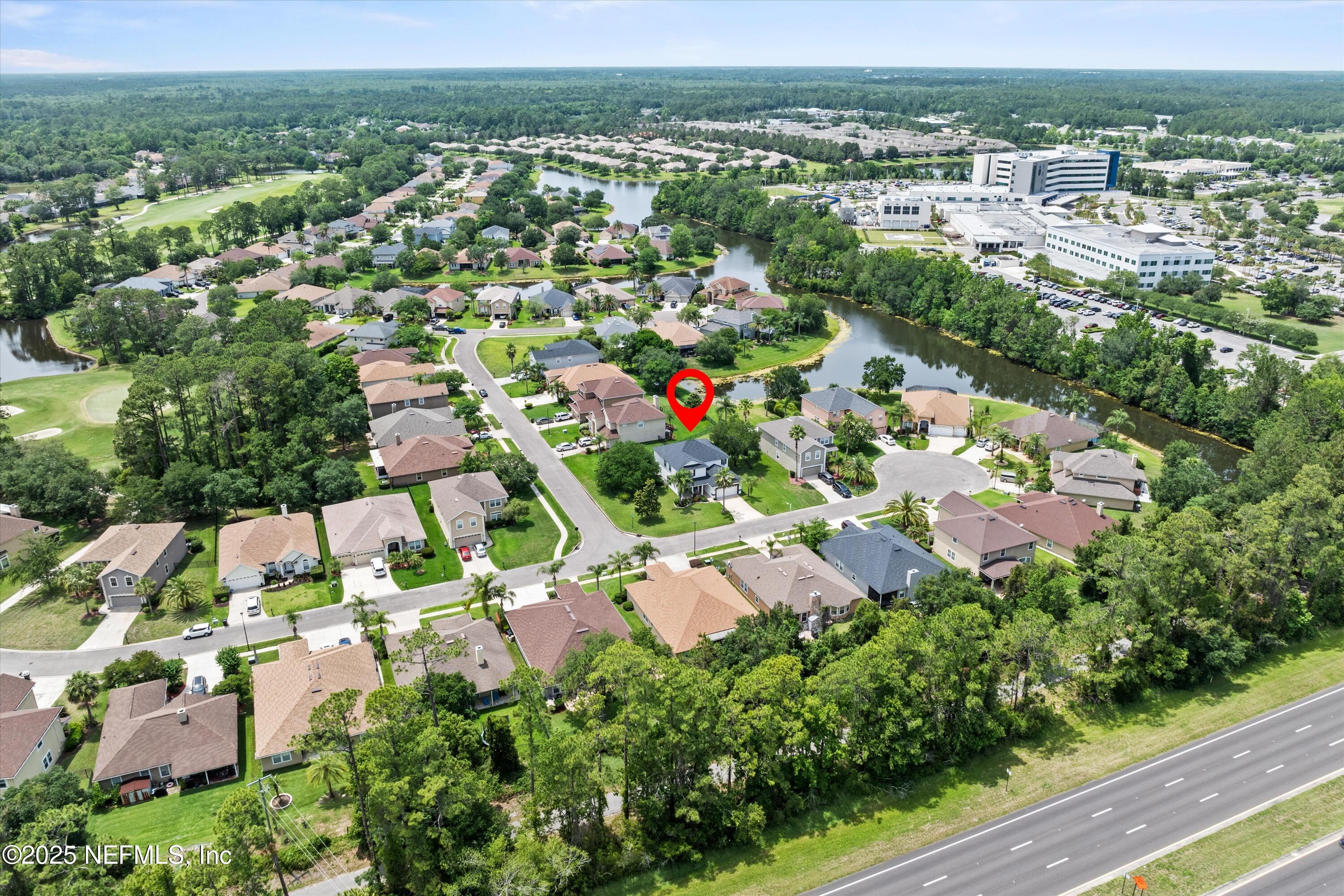 2360 Golfview Drive Fleming Island, FL 32003 - Photo 41 of 60 an aerial view of residential houses with outdoor space and trees