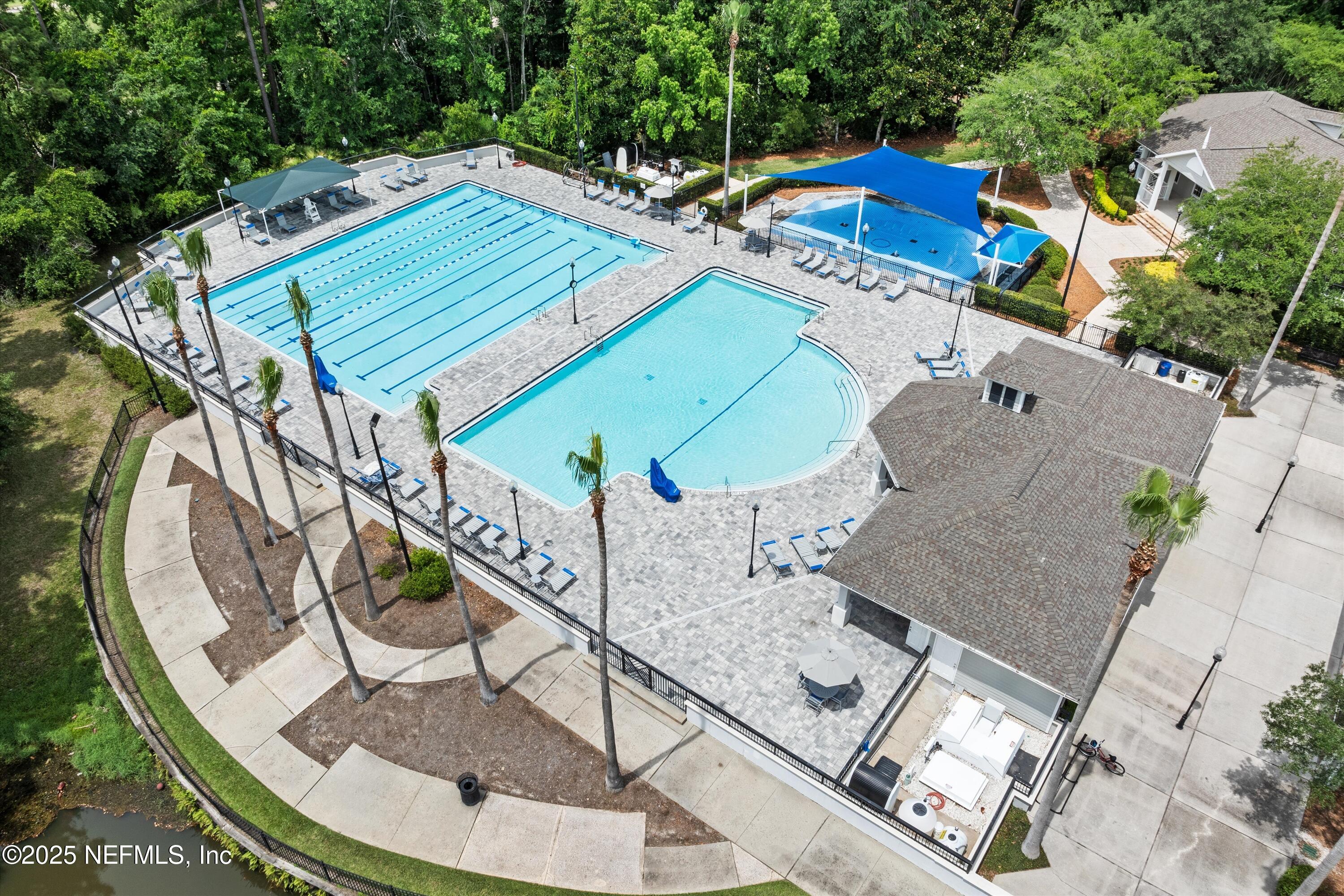 2360 Golfview Drive Fleming Island, FL 32003 - Photo 46 of 60 an aerial view of a house with a yard and potted plants