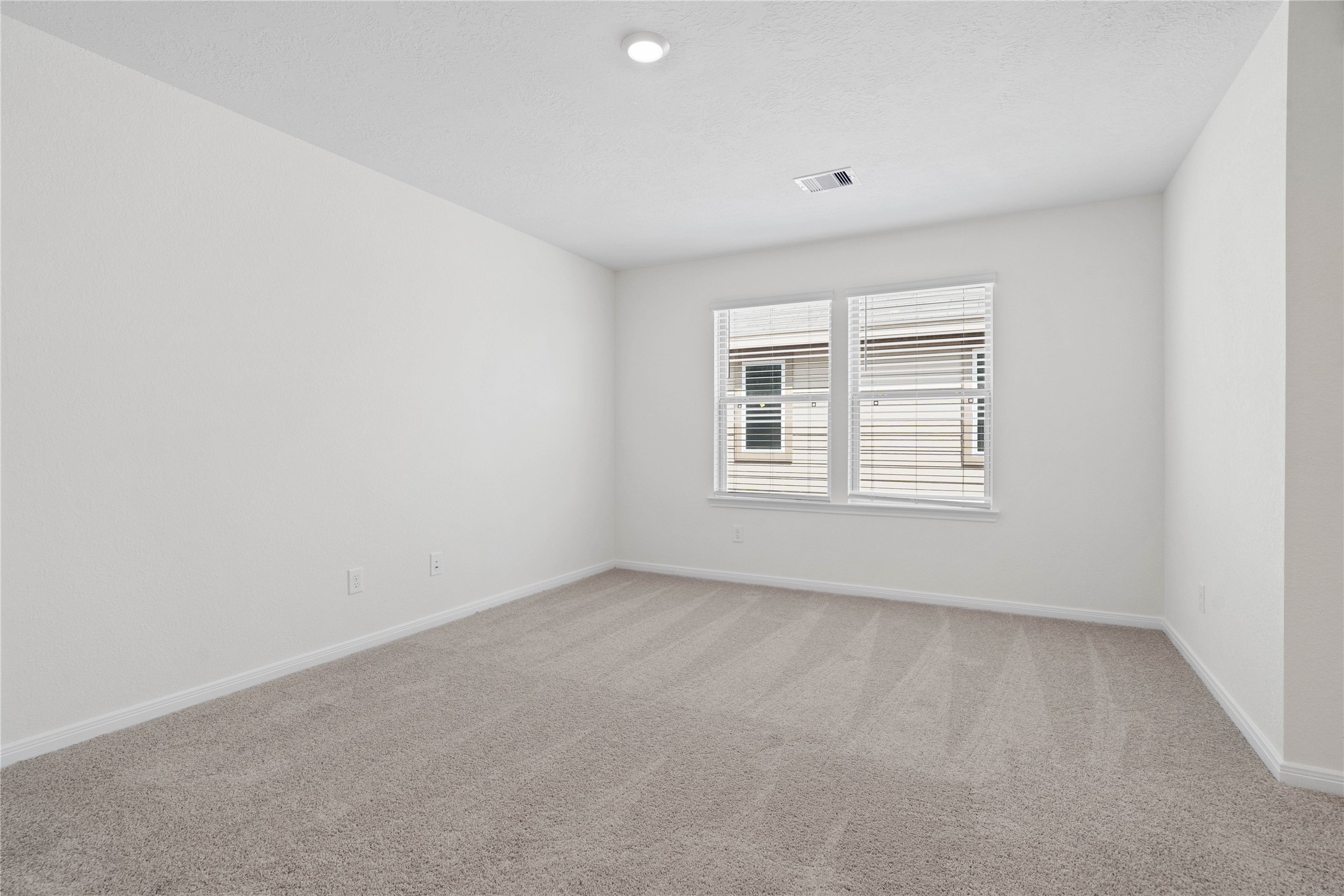 6418 Kentfield Drive Rosharon, TX 77583 - Photo 11 of 23 Head upstairs and enjoy the Loft—an additional living area perfect for a game room, media space, or a peaceful retreat.