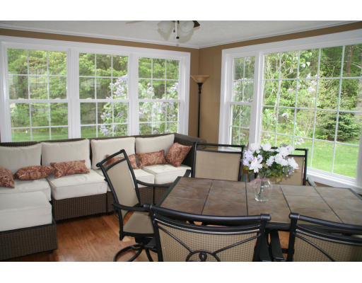 7 Saddle Hill Road Hopkinton, MA 01748 - Photo 8 of 19 a living room with furniture and a large window