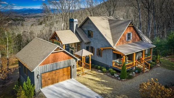 an aerial view of a house with balcony