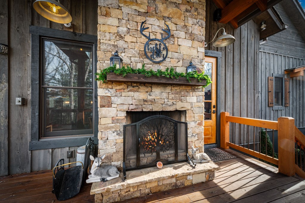 287 Scouts Overlook Lane Morganton, GA 30560 - Photo 9 of 84 a living room with furniture and a fireplace