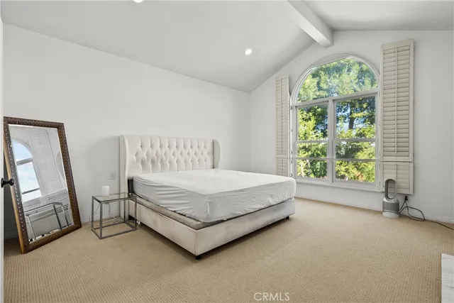 a view of a swimming pool with a yard