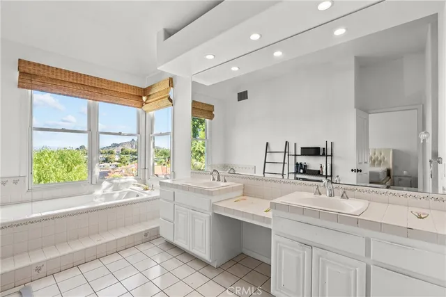 a view of a house with a yard porch and sitting area