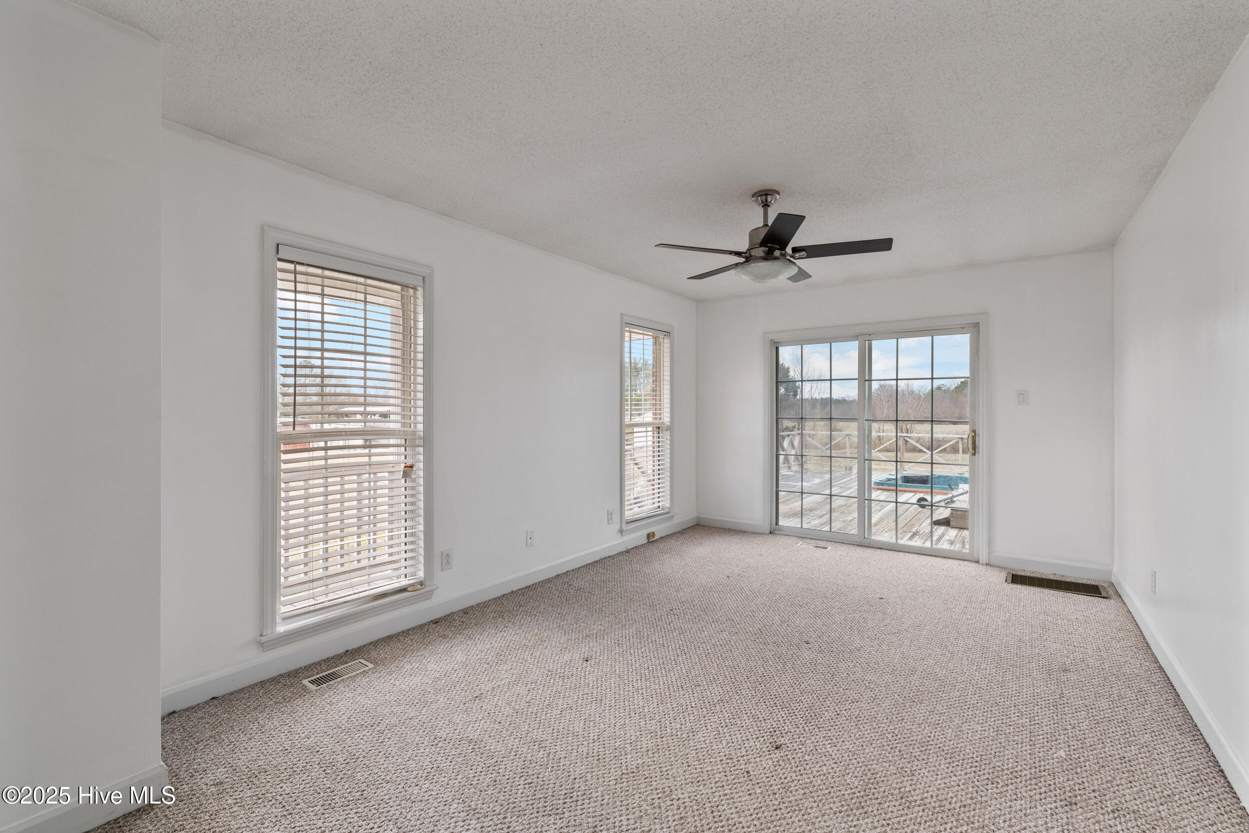 1177 Capps Bridge Road Pikeville, NC 27863 - Photo 11 of 41 Primary Bedroom overlooking the back deck