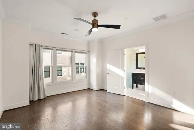 a bathroom with a sink double vanity and a mirror
