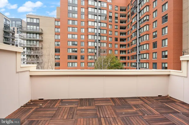 a front view of a building with large windows
