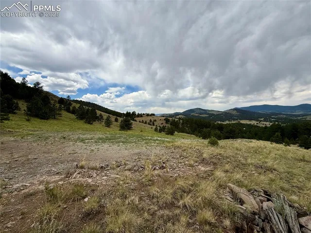 a view of a lake in between two of buildings