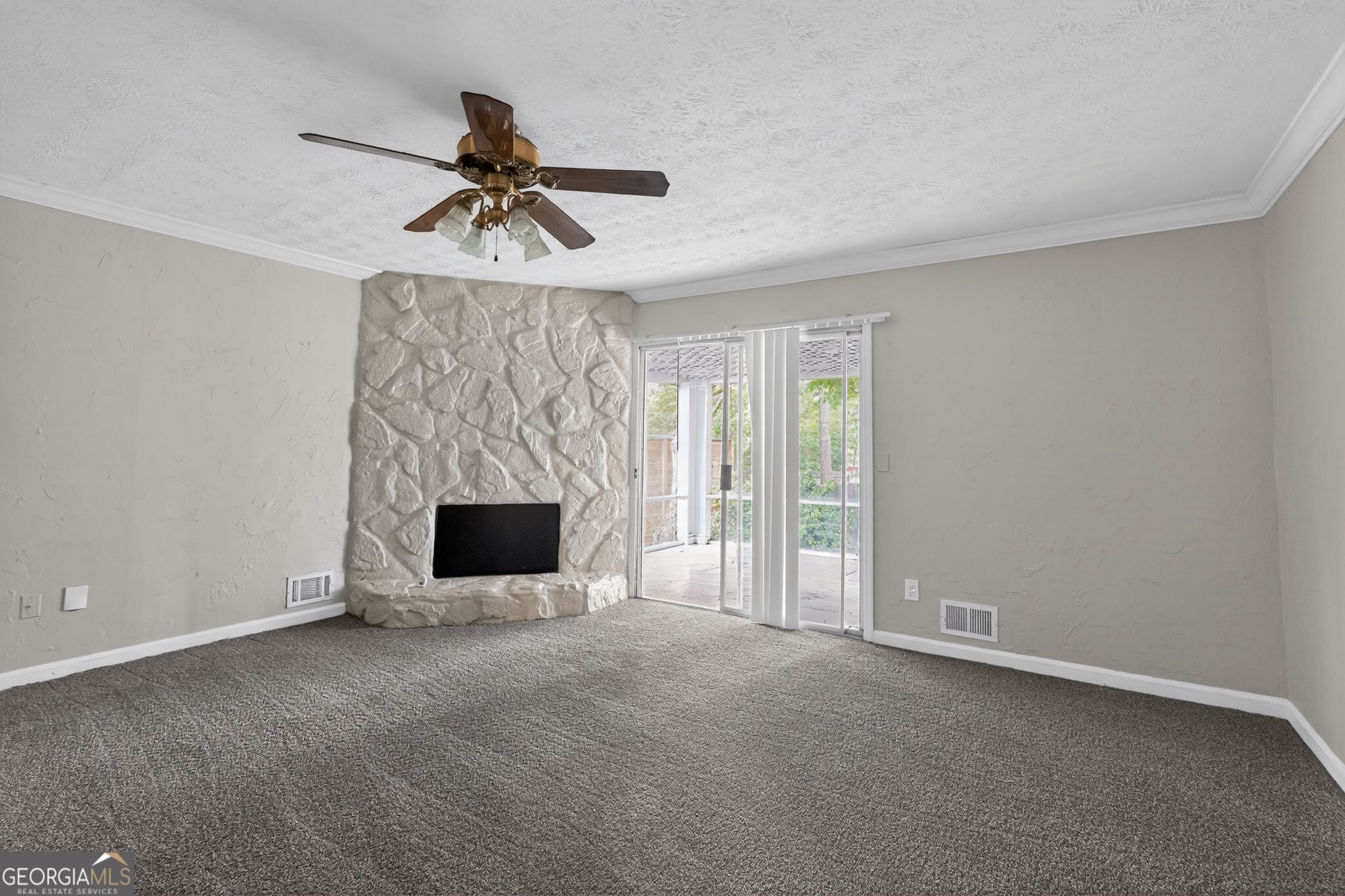 3285 Old Salem Road Southeast Conyers, GA 30013 - Photo 19 of 33 a view of an empty room with window and fireplace