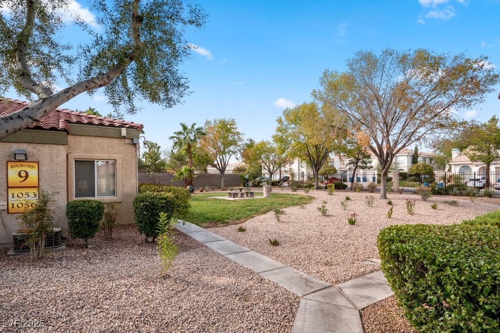 7885 West Flamingo Road, Unit 1053 Las Vegas, NV 89147 - Photo 28 of 33 View of yard featuring a residential view
