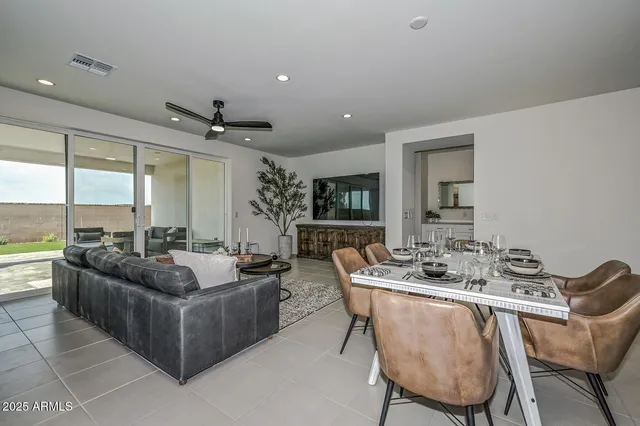 a bedroom with a bed and a cabinet