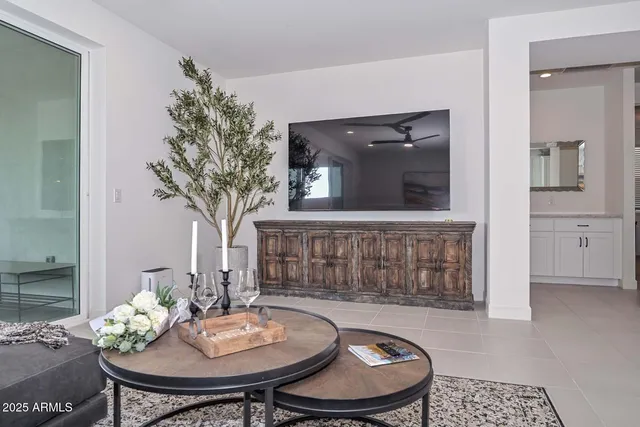 a view of a backyard with plants and lake view